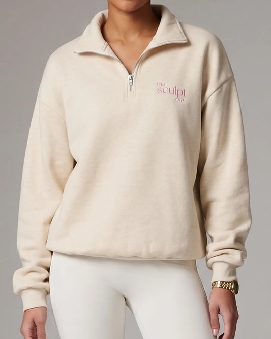 TSC quarterzip in oat worn by model with embroidery logo